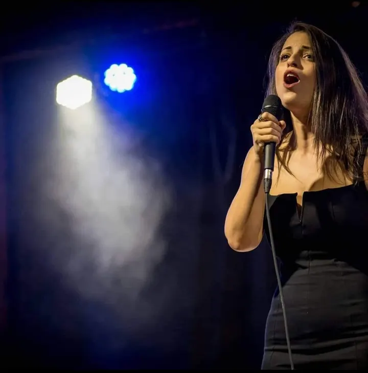 Karen performing on stage